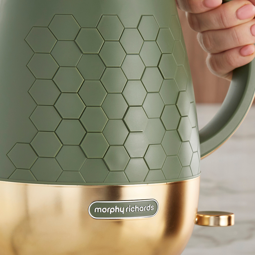 Green and gold kettle with hexagonal pattern, featuring Morphy Richards branding.