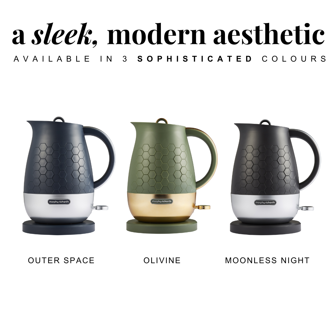 Three electric kettles in 'Outer Space', 'Olivine', and 'Moonless Night' colors on a white background.