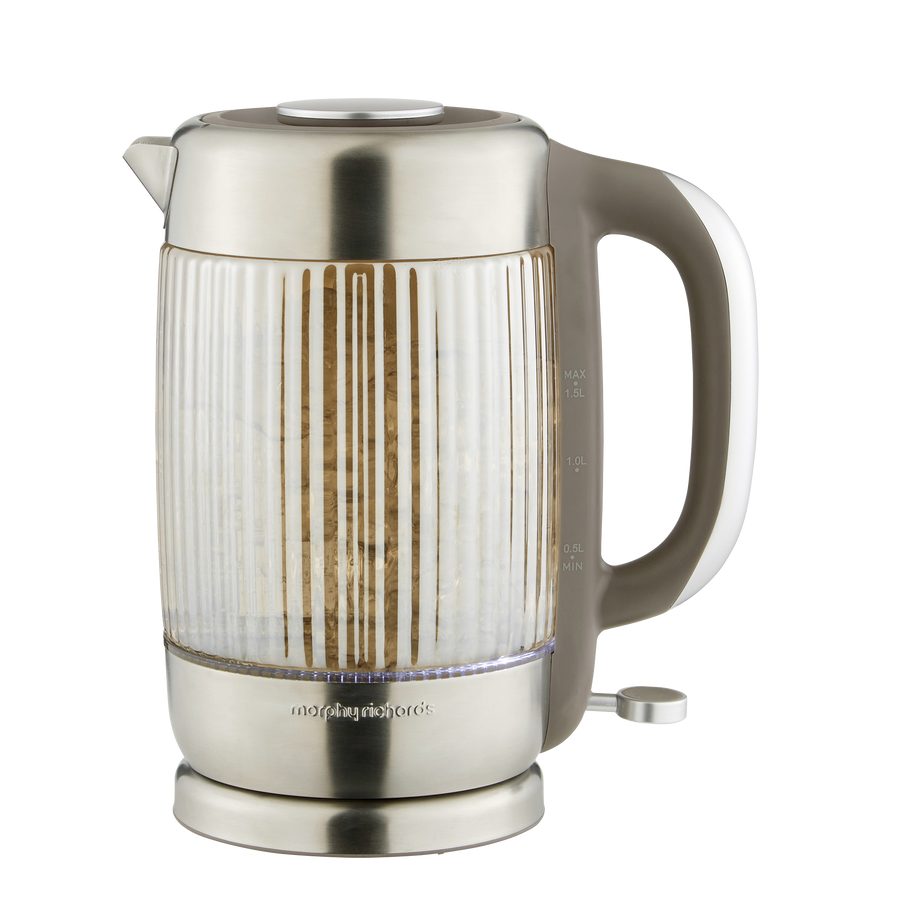 Ribbed glass kettle on a white background
