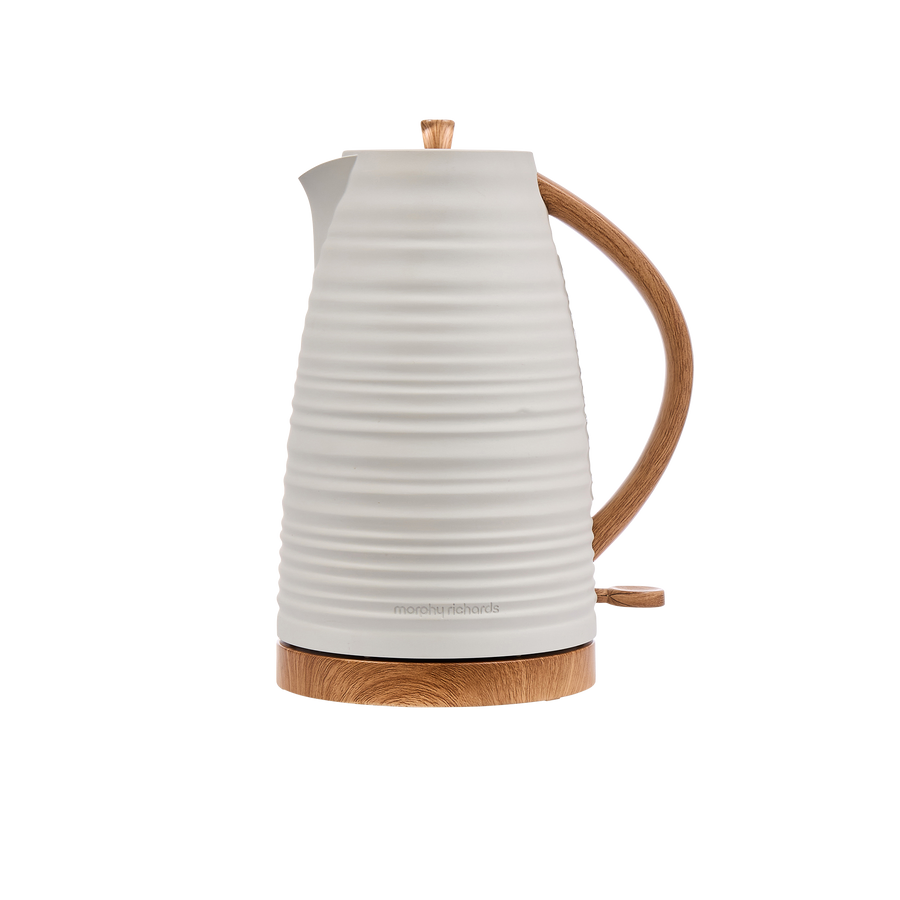 White electric kettle with wooden handle and base on a white background