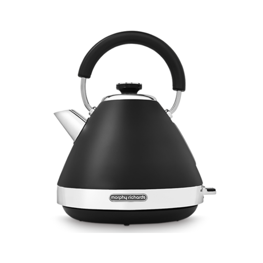 A black pyramid-shaped electric kettle with a white handle and spout cap, featuring a vintage style and a water window.